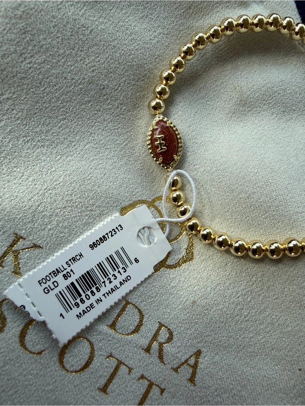 Kendra Scott Gold Beaded Bracelet with Brown Football Charm